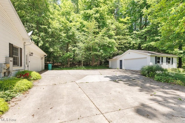 9502 Winchester Vly, Chesterland, OH 44026 - exterior space with a garage and an outbuilding