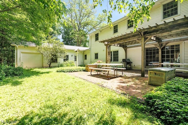 9502 Winchester Vly, Chesterland, OH 44026 - rear view of property featuring a lawn, a garage, and a patio