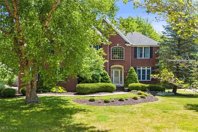 3519 Hawthorne Trl, Broadview Heights, OH 44147 - colonial-style house with a front yard and brick siding