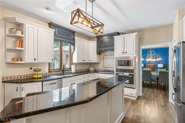 3519 Hawthorne Trl, Broadview Heights, OH 44147 - kitchen featuring appliances with stainless steel finishes, white cabinetry, and wood finished floors
