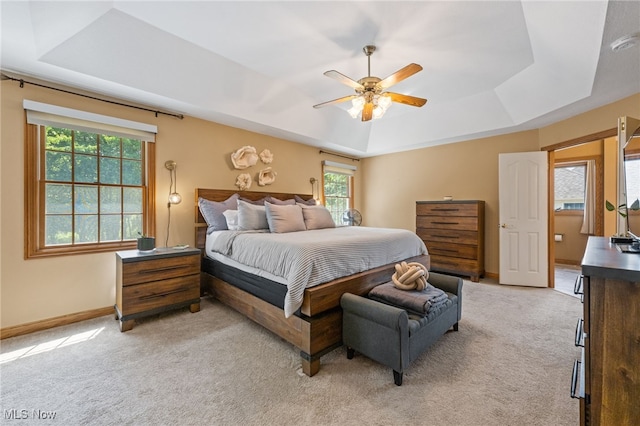 3519 Hawthorne Trl, Broadview Heights, OH 44147 - bedroom featuring a raised ceiling, light colored carpet, and a ceiling fan