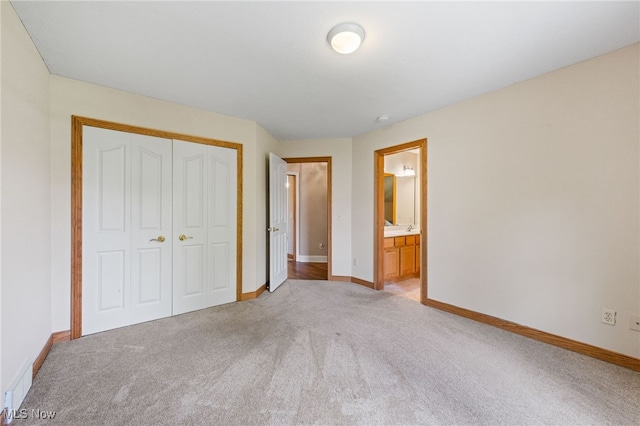 3519 Hawthorne Trl, Broadview Heights, OH 44147 - unfurnished bedroom featuring light carpet, a closet, and connected bathroom