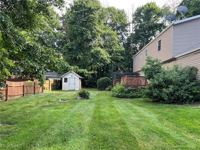8602 Wedgewood Ave NW, North Canton, OH 44720 - view of yard featuring a storage shed and a deck