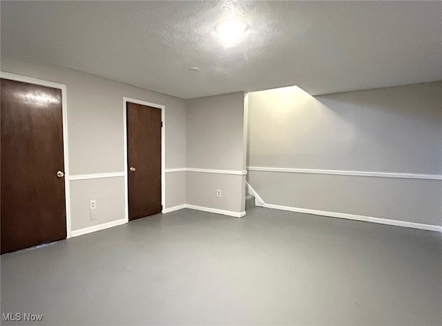 8602 Wedgewood Ave NW, North Canton, OH 44720 - below grade area featuring baseboards