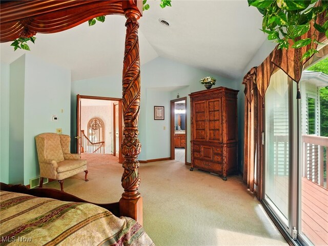 2526 Ashbrook Dr, Ashtabula, OH 44004 - bedroom featuring light carpet, vaulted ceiling, access to outside, and ensuite bath