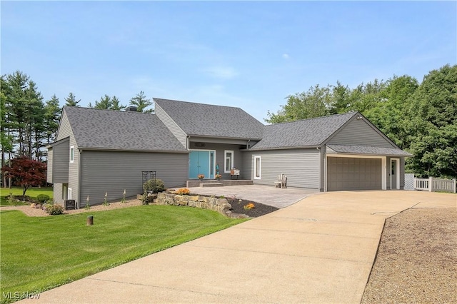 13645 Salem Church St NE, Paris, OH 44669 - view of front facade with driveway, an attached garage, and roof with shingles