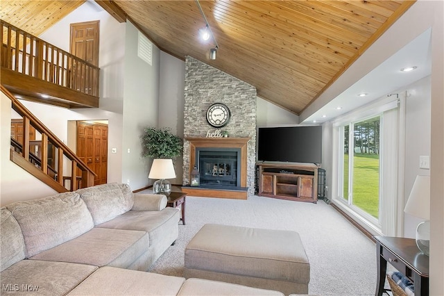 13645 Salem Church St NE, Paris, OH 44669 - carpeted living room with wood ceiling, stairway, a stone fireplace, high vaulted ceiling, and recessed lighting