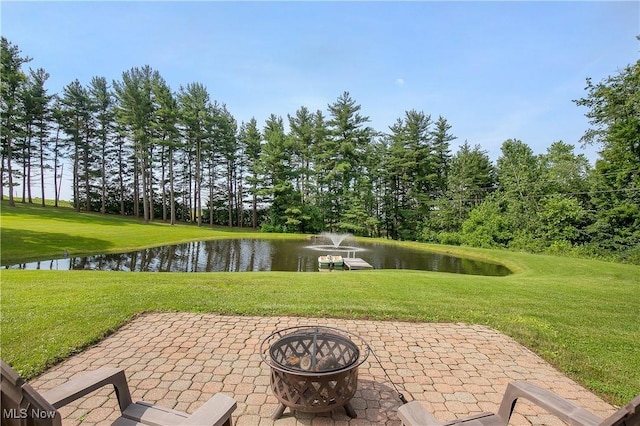 13645 Salem Church St NE, Paris, OH 44669 - view of patio / terrace with an outdoor fire pit and a water view