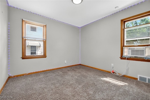 5077 Catherine St, Maple Heights, OH 44137 - carpeted spare room featuring baseboards and cooling unit