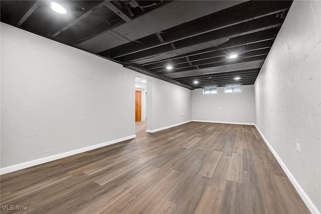 5077 Catherine St, Maple Heights, OH 44137 - below grade area featuring wood finished floors and baseboards
