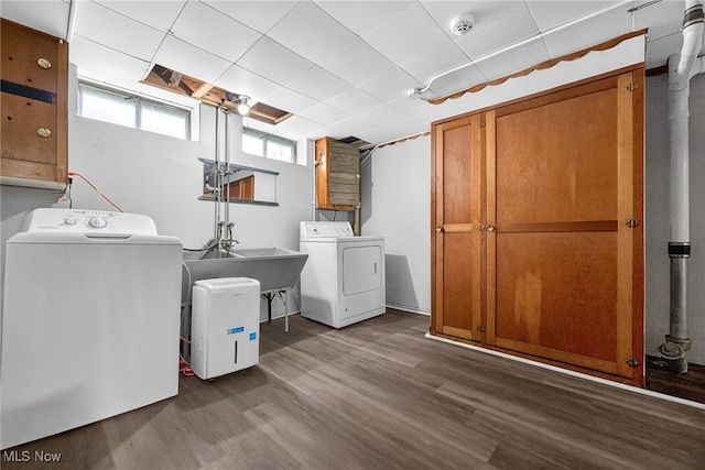 5077 Catherine St, Maple Heights, OH 44137 - laundry room featuring washing machine and dryer and wood finished floors