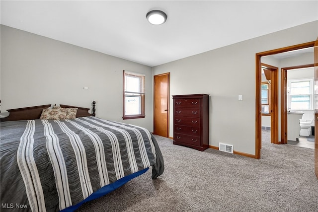 5077 Catherine St, Maple Heights, OH 44137 - bedroom with carpet floors and baseboards