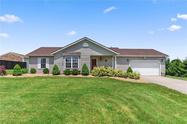 5215 River Rd, Madison, OH 44057 - single story home with a garage and driveway