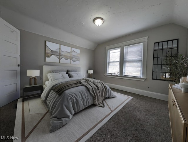 1268 E 169th St, Cleveland, OH 44110 - bedroom featuring vaulted ceiling and dark colored carpet