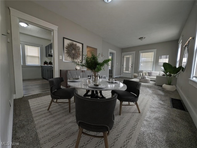 1268 E 169th St, Cleveland, OH 44110 - carpeted dining room with baseboards