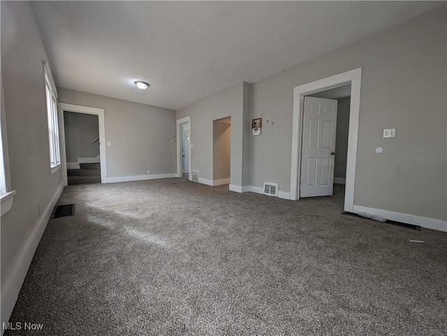 1268 E 169th St, Cleveland, OH 44110 - unfurnished room with carpet floors and baseboards