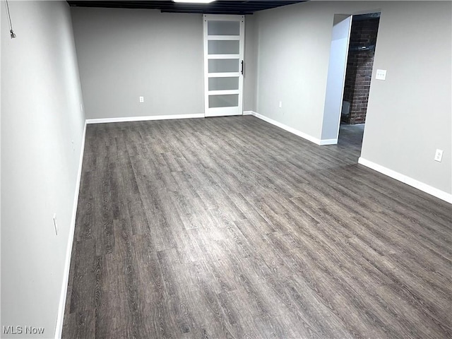 1760 Glenmount Ave, Akron, OH 44301 - finished basement with dark wood finished floors and baseboards