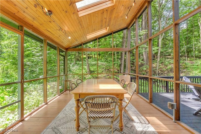 820 Old Spring Rd, Copley, OH 44321 - sunroom featuring a skylight, vaulted ceiling, and outdoor dining area