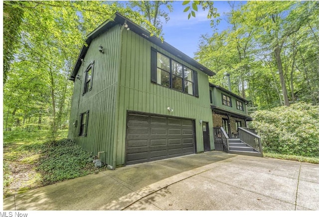 820 Old Spring Rd, Copley, OH 44321 - view of front facade with an attached garage and driveway