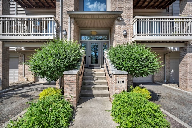 3800 Rosemont Blvd Unit 114C, Akron, OH 44333 - entrance to property with brick siding, a balcony, and french doors