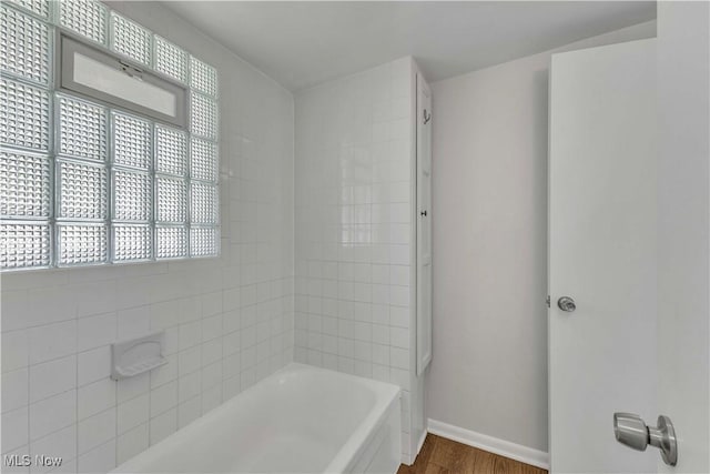 259 Marion Dr, Bedford, OH 44146 - full bath with wood finished floors, plenty of natural light, and shower / washtub combination