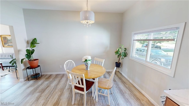 409 W Grant St, Kent, OH 44240 - dining space featuring light wood-style flooring and baseboards