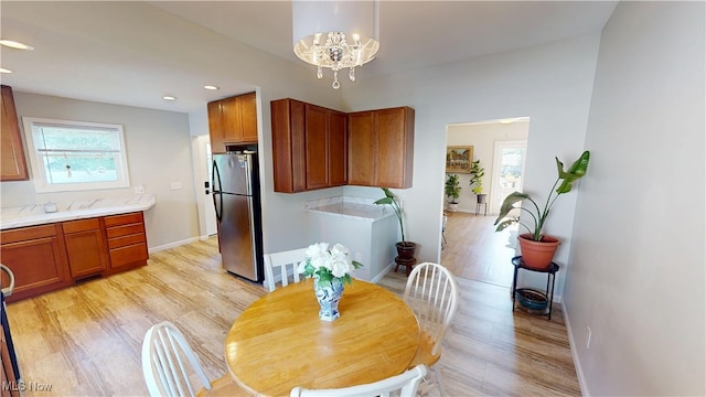 409 W Grant St, Kent, OH 44240 - dining space featuring a chandelier, light wood finished floors, and recessed lighting