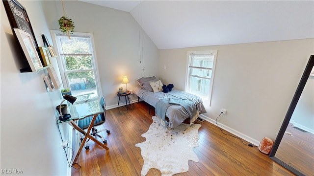 409 W Grant St, Kent, OH 44240 - bedroom featuring vaulted ceiling and wood-type flooring