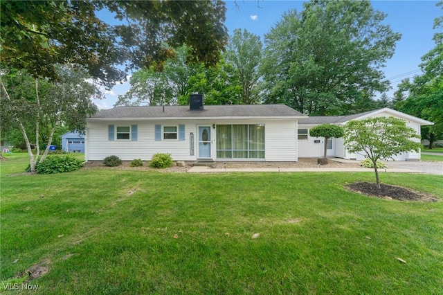 293 W 14th St, Salem, OH 44460 - ranch-style house with a front lawn and a chimney