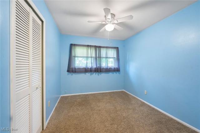 293 W 14th St, Salem, OH 44460 - unfurnished bedroom featuring a closet, carpet flooring, and a ceiling fan