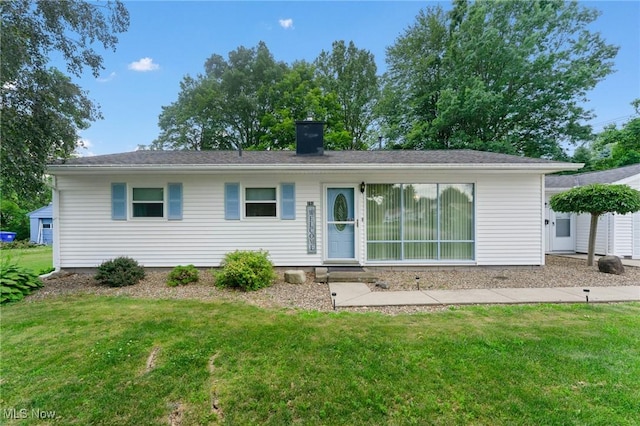 293 W 14th St, Salem, OH 44460 - view of front of property with a front lawn and a chimney