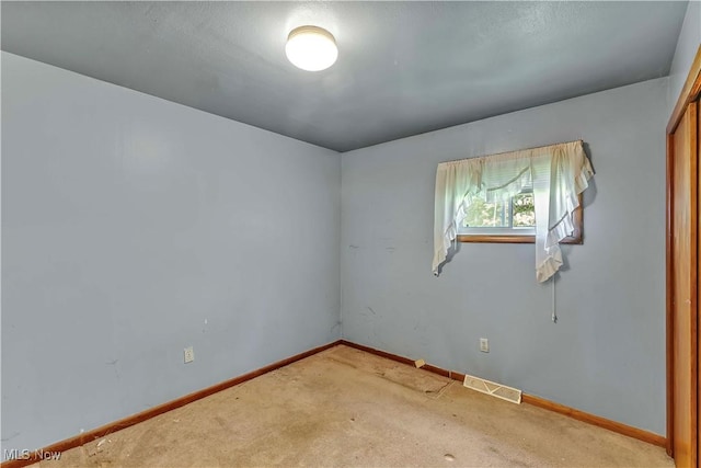 321 Overlook Rd, Vermilion, OH 44089 - unfurnished room with light carpet and baseboards
