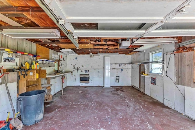 321 Overlook Rd, Vermilion, OH 44089 - garage with heating unit and a garage door opener