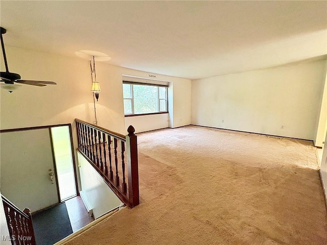 10511 Darrow Rd, Vermilion, OH 44089 - empty room with carpet flooring and ceiling fan