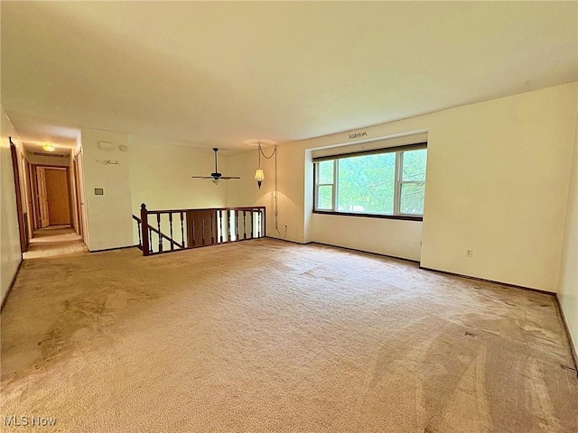 10511 Darrow Rd, Vermilion, OH 44089 - spare room featuring carpet floors and a ceiling fan