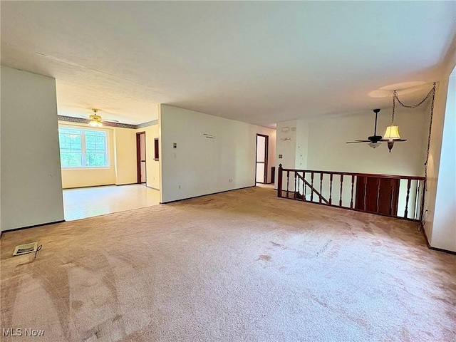 10511 Darrow Rd, Vermilion, OH 44089 - spare room featuring a ceiling fan and carpet