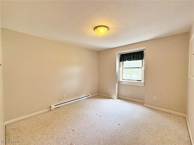 10511 Darrow Rd, Vermilion, OH 44089 - unfurnished room with baseboard heating and carpet floors