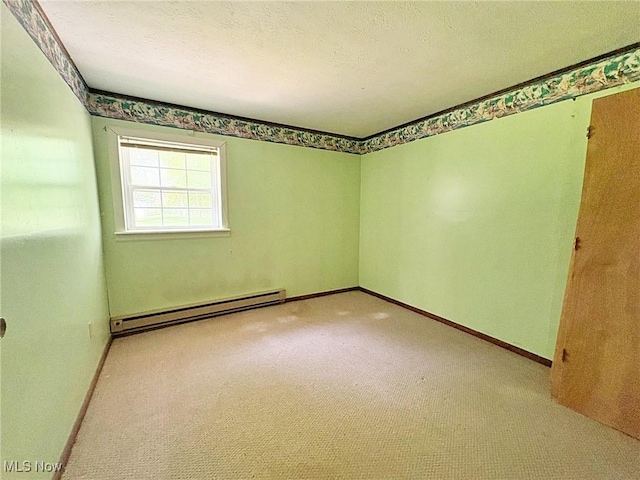 10511 Darrow Rd, Vermilion, OH 44089 - spare room featuring baseboard heating and carpet