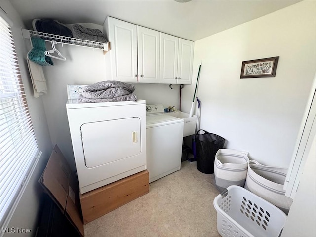 470 Geneva Ave, Struthers, OH 44471 - washroom with cabinet space, washing machine and dryer, and light colored carpet