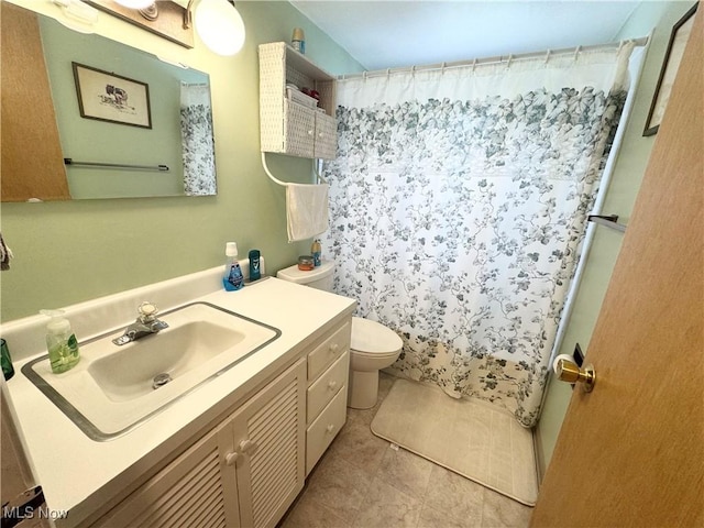 470 Geneva Ave, Struthers, OH 44471 - bathroom with vanity, a shower with shower curtain, and tile patterned floors