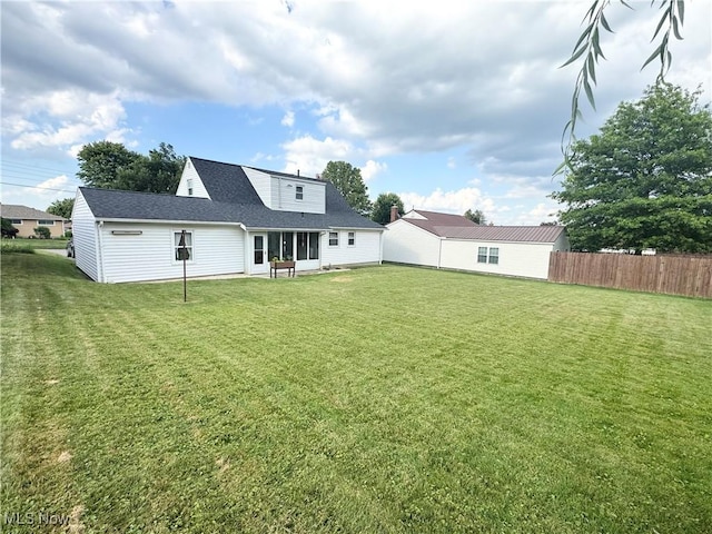 470 Geneva Ave, Struthers, OH 44471 - rear view of property featuring roof with shingles