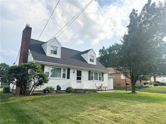 470 Geneva Ave, Struthers, OH 44471 - cape cod home with a front yard, a chimney, and a shingled roof