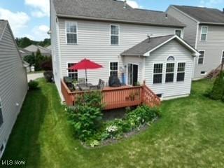 933 Alder Run Way, Akron, OH 44333 - rear view of property featuring a deck and a lawn