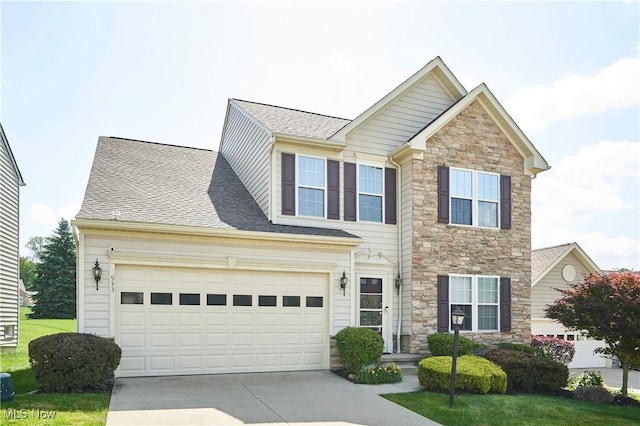 933 Alder Run Way, Akron, OH 44333 - traditional-style home with stone siding, concrete driveway, and a shingled roof