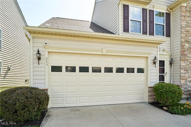 933 Alder Run Way, Akron, OH 44333 - garage featuring concrete driveway