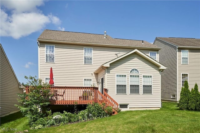 933 Alder Run Way, Akron, OH 44333 - rear view of house featuring a deck and a lawn