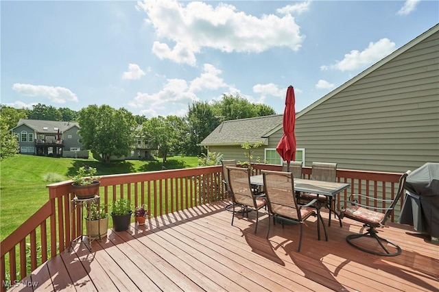 933 Alder Run Way, Akron, OH 44333 - wooden deck with a lawn, outdoor dining space, and grilling area