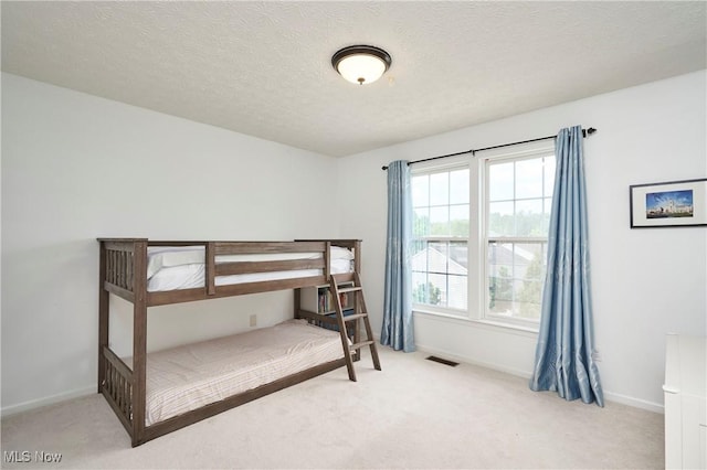 933 Alder Run Way, Akron, OH 44333 - bedroom with carpet flooring and a textured ceiling