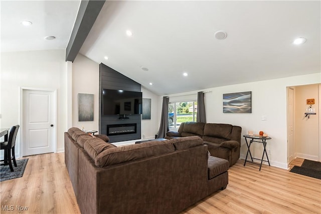 3316 Wadsworth Rd, Norton, OH 44203 - living room with light wood-style floors, a large fireplace, and recessed lighting