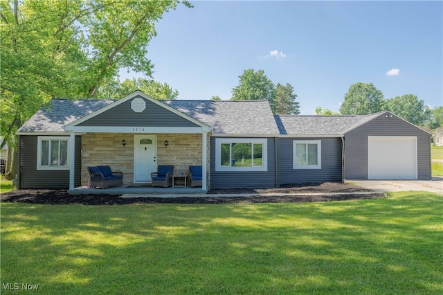 3316 Wadsworth Rd, Norton, OH 44203 - single story home featuring a porch, a front yard, a garage, and roof with shingles